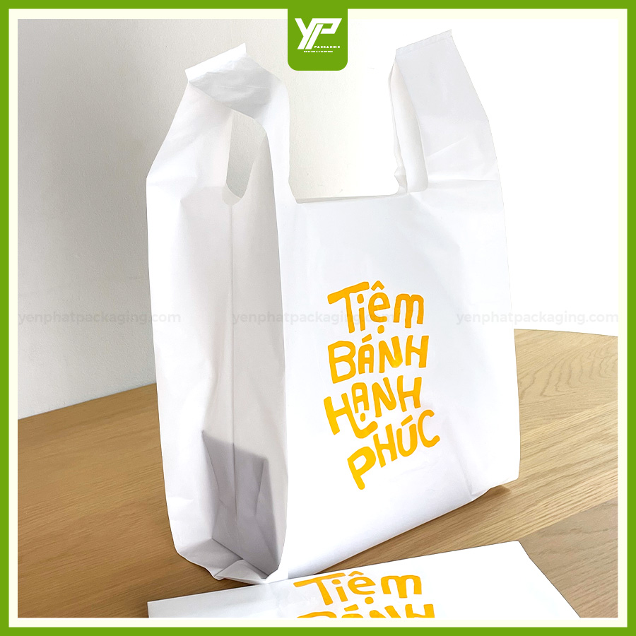 TÚI QUAI SỮA - TÚI NILON 2 QUAI ĐỦ KÍCH THƯỚC IN ẤN TỪ 10KG 3 tui quai sua co in